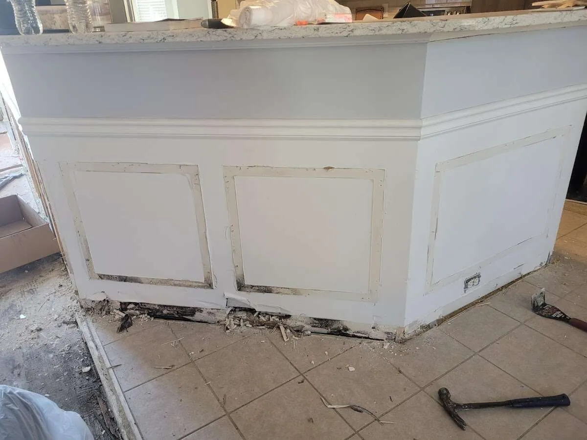 Water damage and mold on kitchen during Storm Damage Restoration in Suffern